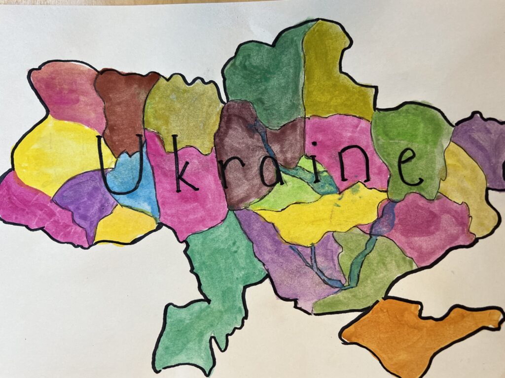 tecknade regioner i en karta av ukraina i olika färger texten Ukraine